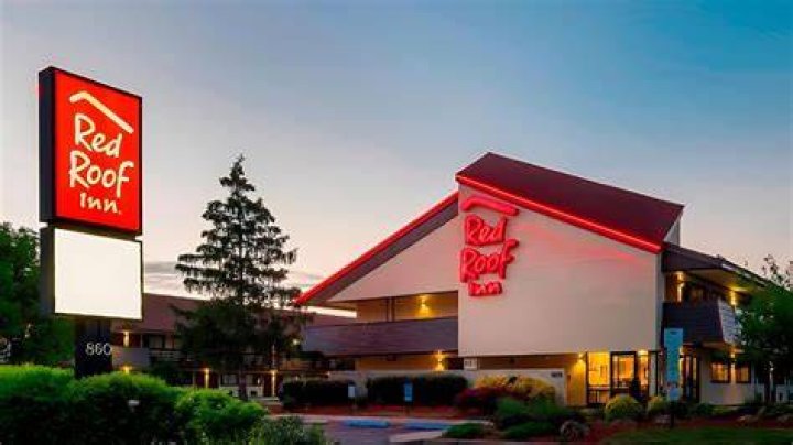 What company owns Red Roof Inn?